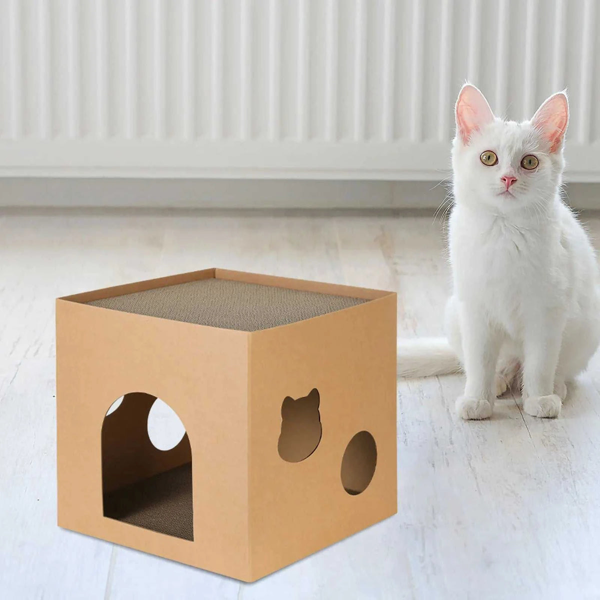 Cat Cardboard House made from brown corrugated cardboard with an arched entrance and cut-out cat and circular shapes on the sides