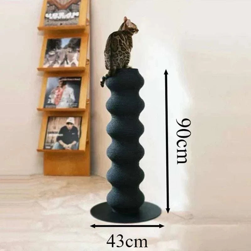 Cat Scratching Post in black with a textured wavy column design and circular base, topped with a cat sitting