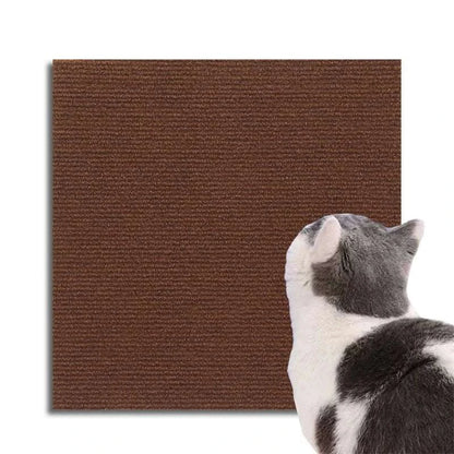 Self Adhesive Cat Scratcher Mat in brown textured felt with a grey and white cat scratching the corner