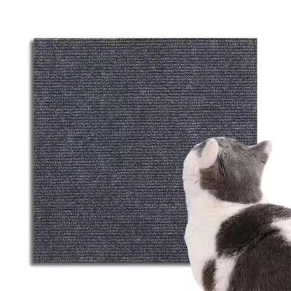 Self Adhesive Cat Scratcher Mat in dark grey felt with a textured surface shown with a white and grey cat scratching it